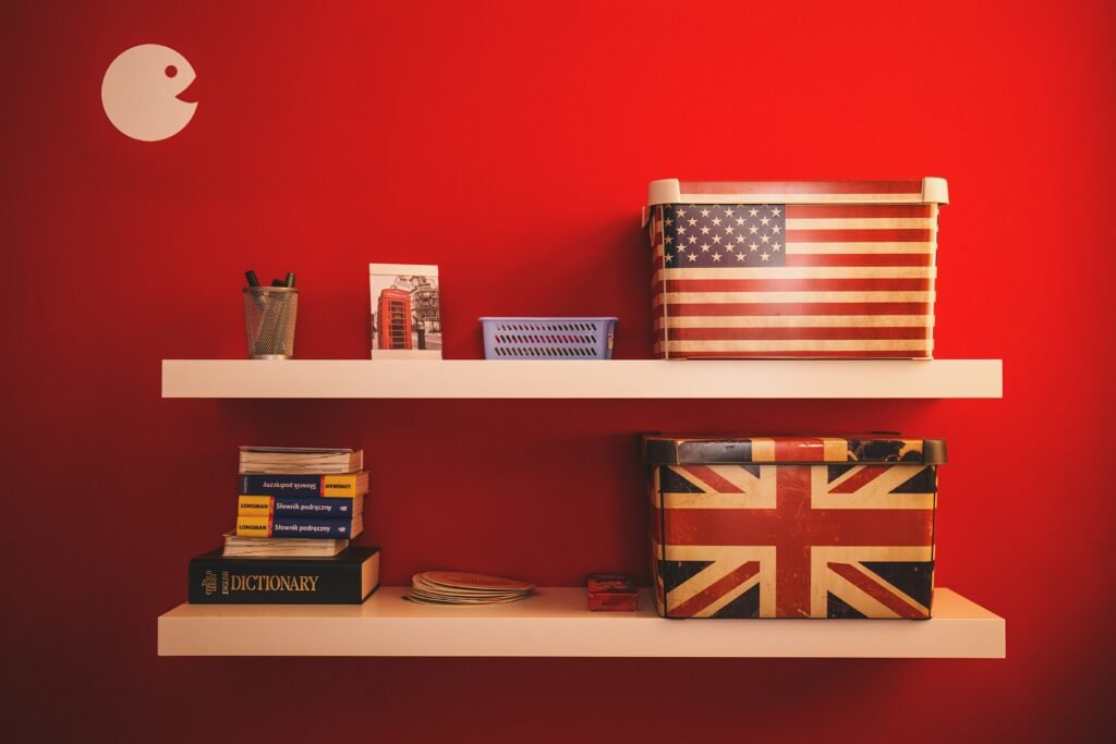 A bookshelf with English manuals and dictionaries used for language learning