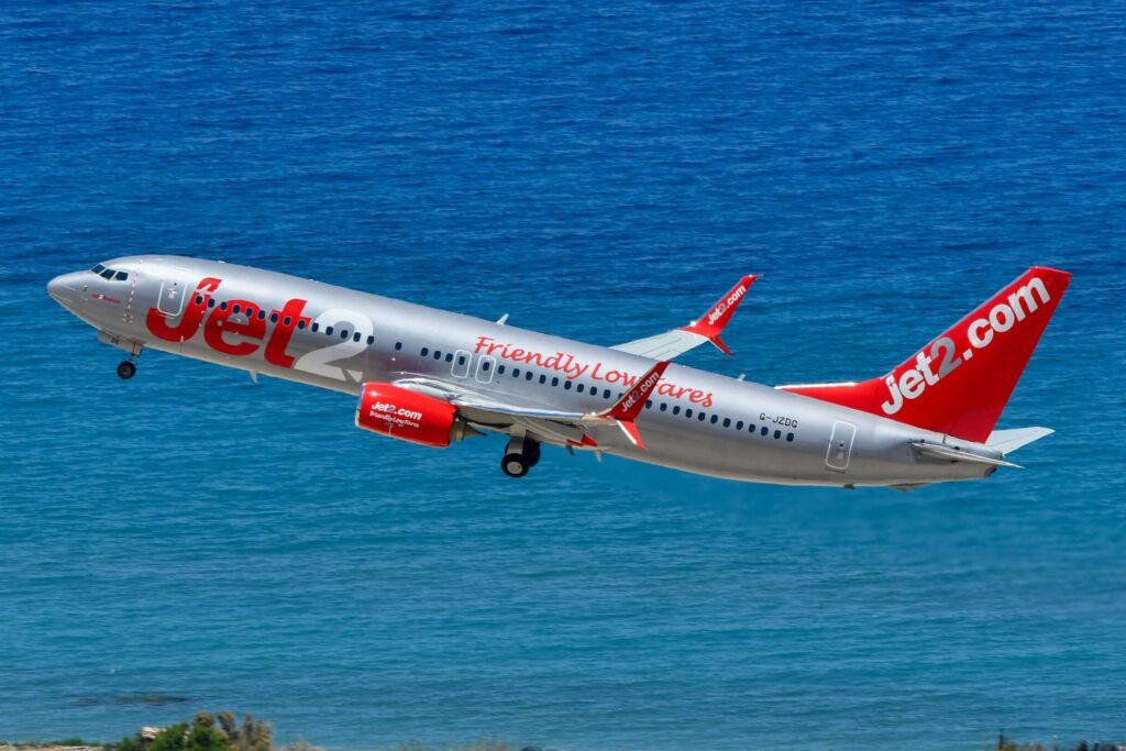 Jet2.com Boeing 737 taking off over the sea, the airline that recruits Jet2 cabin crew